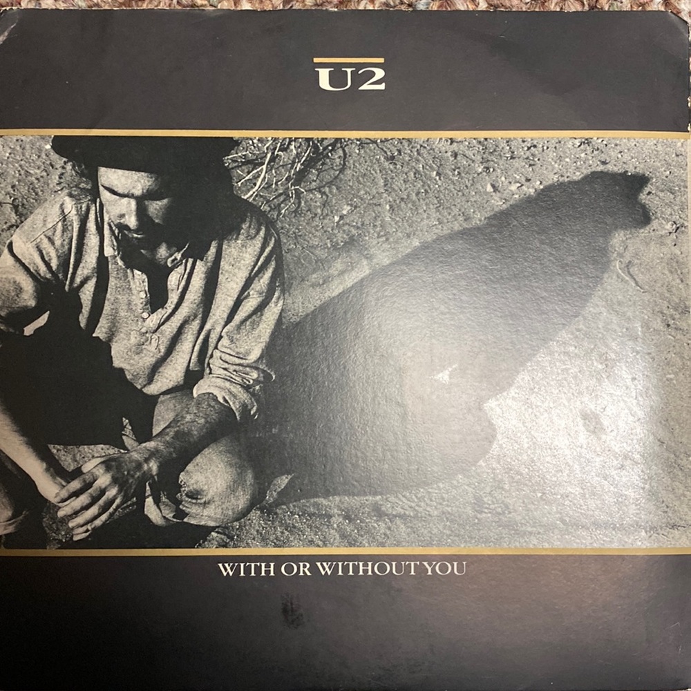 U2 vinyl records “with or without you” single 
45 Vinyl Record 1987 original